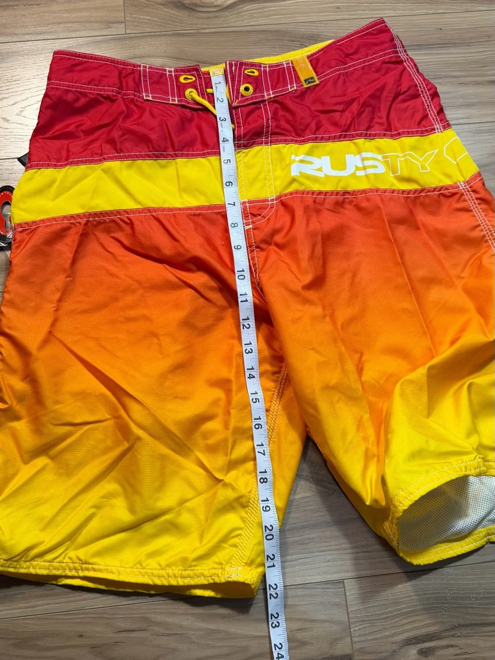 Brand new with tags Rusty Men’s Gradient Red-Orange-Yellow Swim Trunks